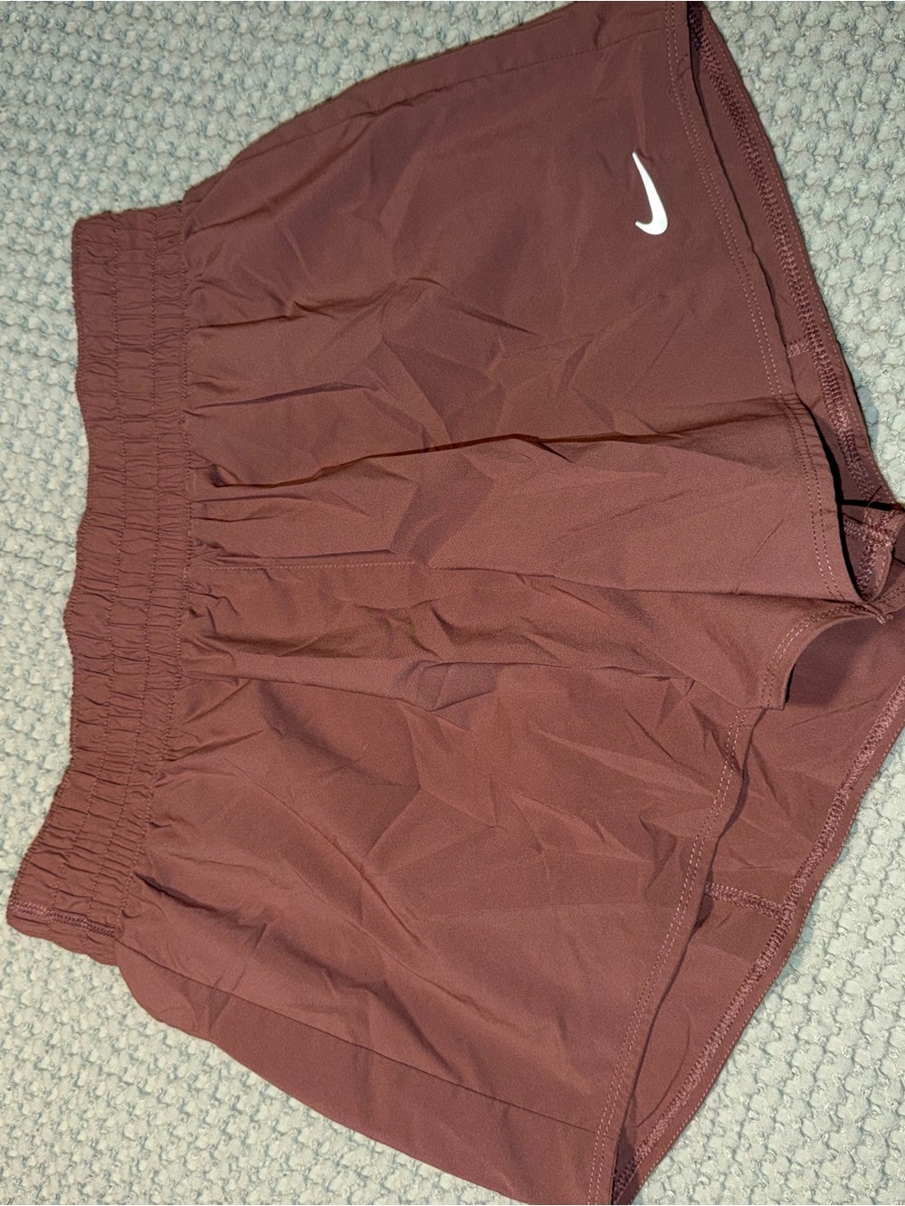 Nike Women’s Burgundy Athletic Shorts with White Swoosh